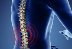 Human back in pulsating pain